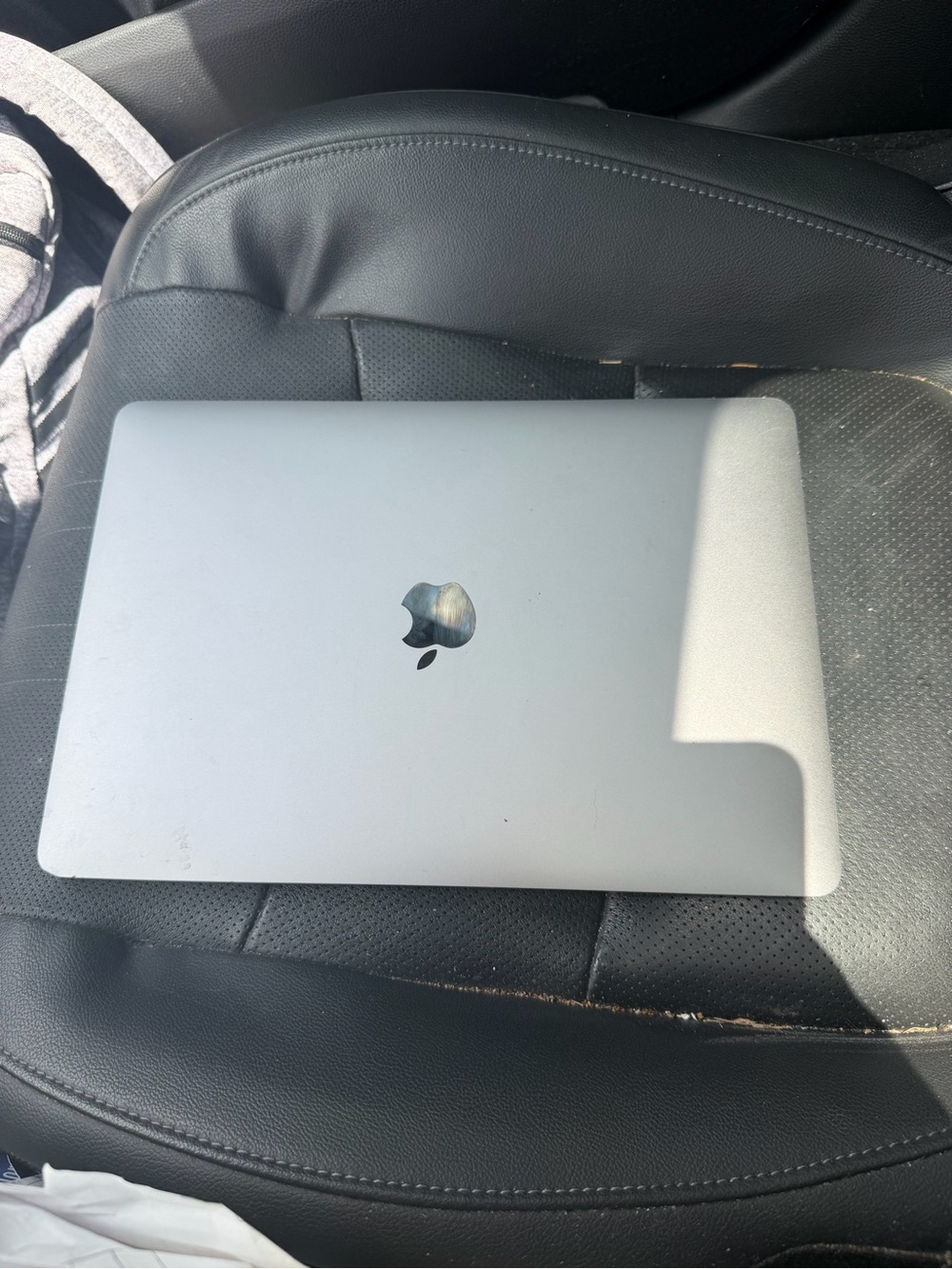 Apple Silver MacBook Laptop with Apple Logo